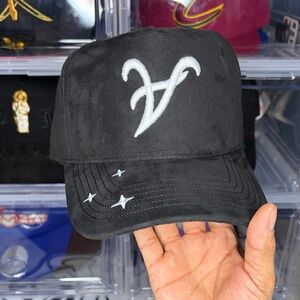 Black Cap with El Mago on the side stitch